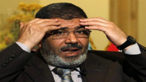 وسط إجراءات أمنية مكثفة.. الرئيس المصري "محمد مرسي" يمثل اليوم أمام المحكمة