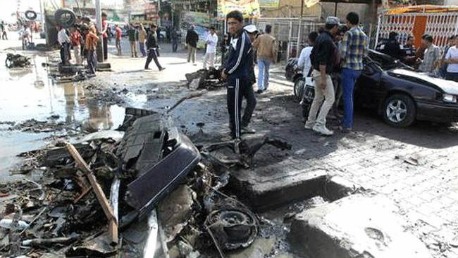 مقتل وإصابة العشرات بانفجارات في بغداد KK