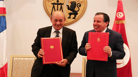 وزير الشؤون الخارجية الفرنسي جان إيف لودريان ووزير خارجية تونس 