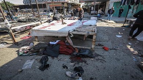 32 قتيلا و110 جرحى في تفجيرين إرهابيين وسط بغداد